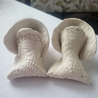 Porcelain Baby Shoes by Holly Mullarkey